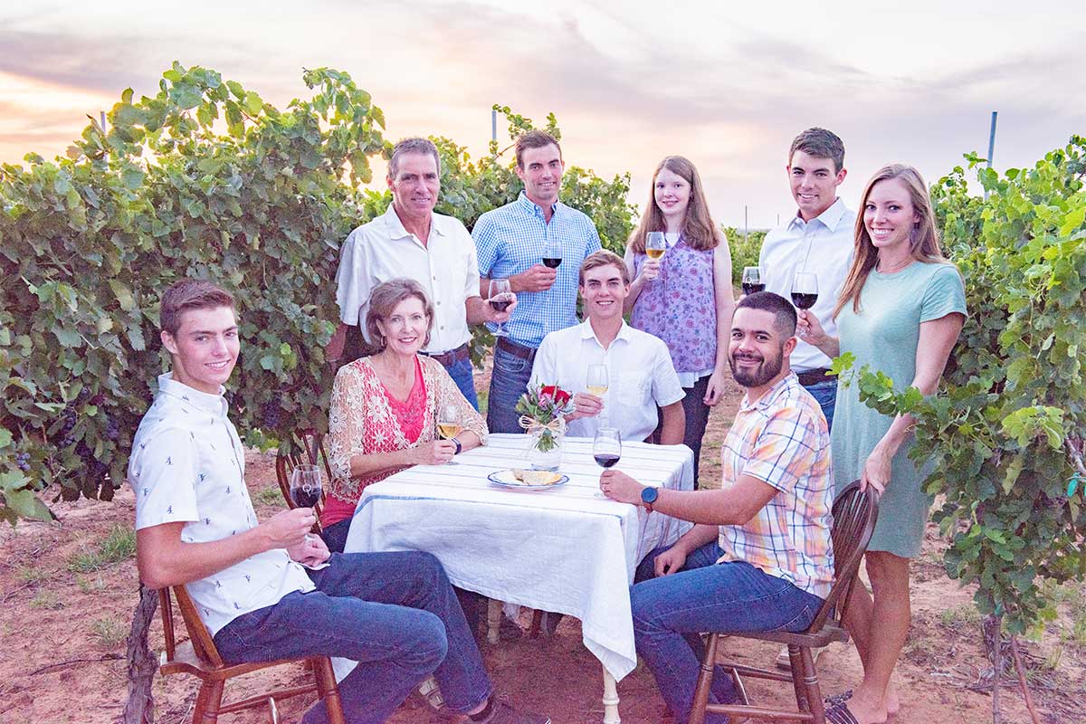Oswalf family in vineyard