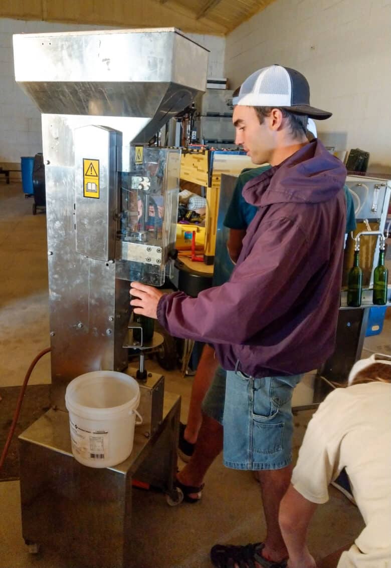 Bottling 2017 Vintage - the corking station, corking the bottles.