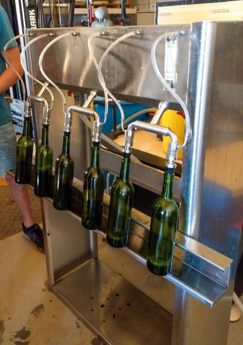 Bottling 2017 Vintage - the bottler filling the bottles.