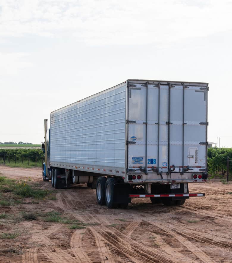 Roussanne and Albarino Harvest 2021 Full semi-truck of grapes leaving the vineyard.