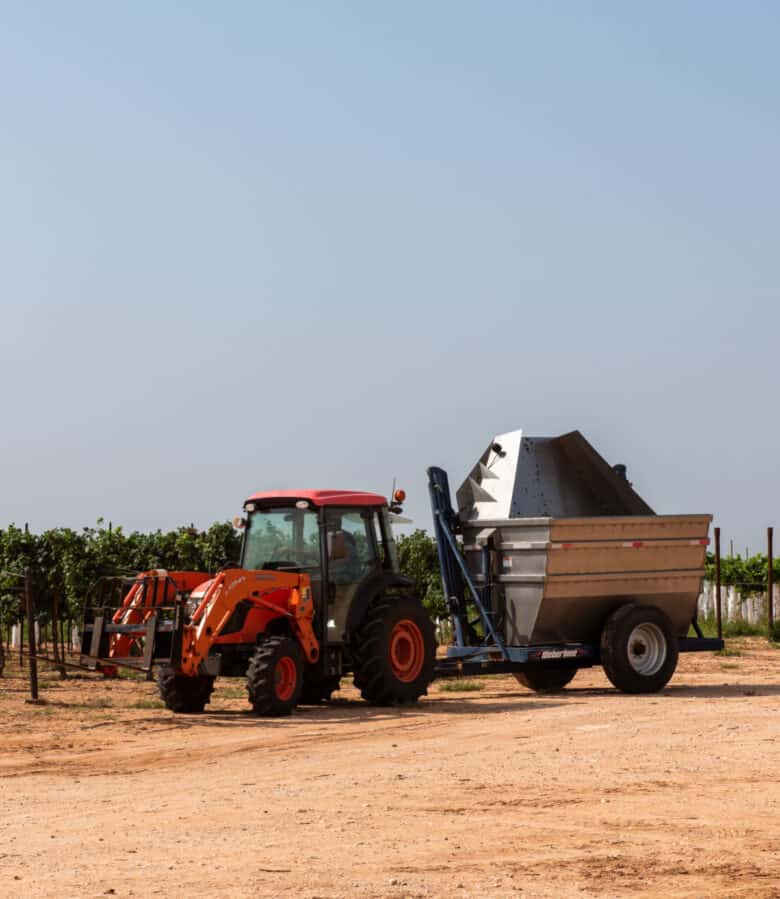 Roussanne and Albarino Harvest 2021 - The tractor and dump buggy ready for another load of grapes.
