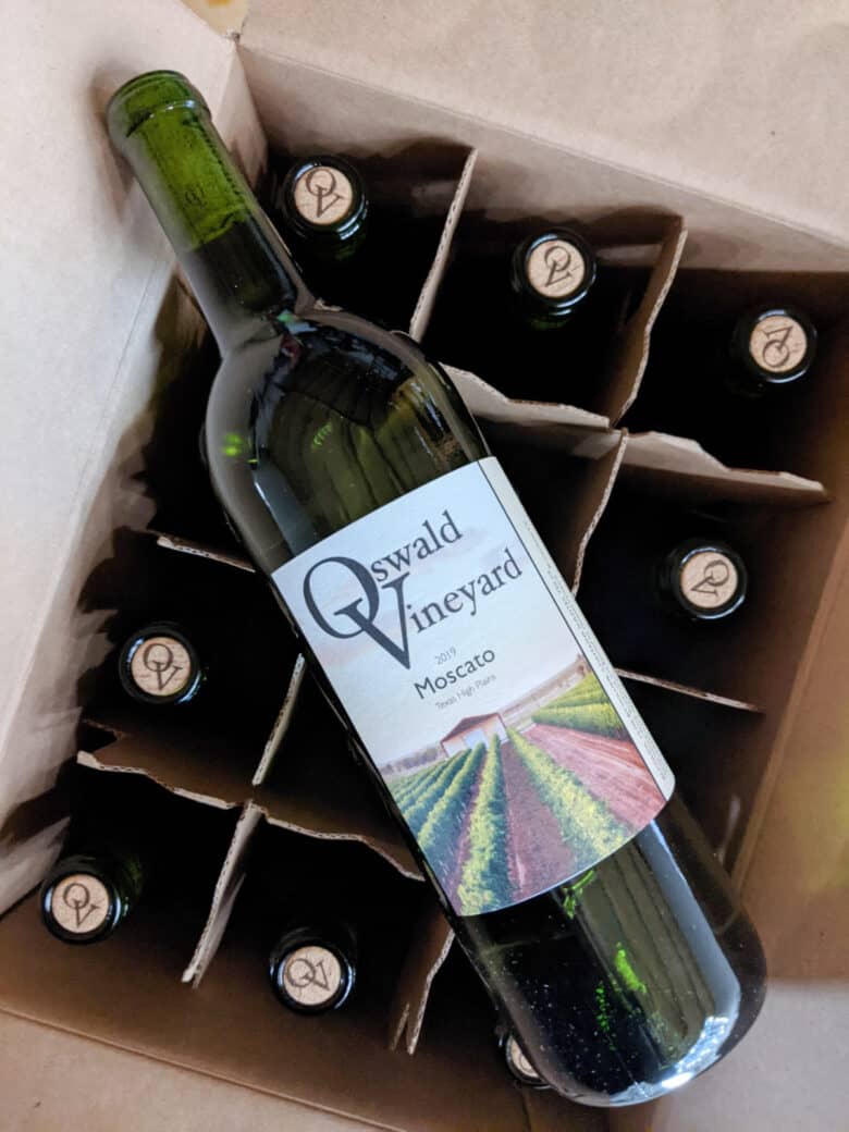 Bottling and Labeling Moscato 2019 - wine bottles in/on the box.