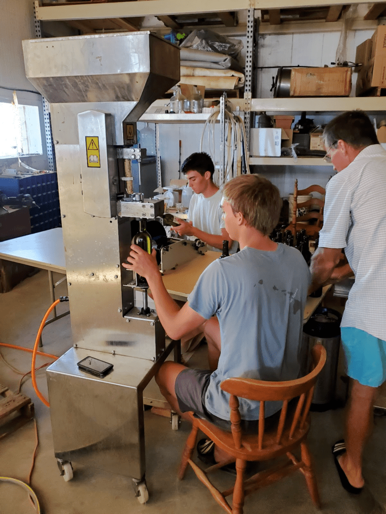 Roussanne 2018 is Bottled and Labeled - bottle corker