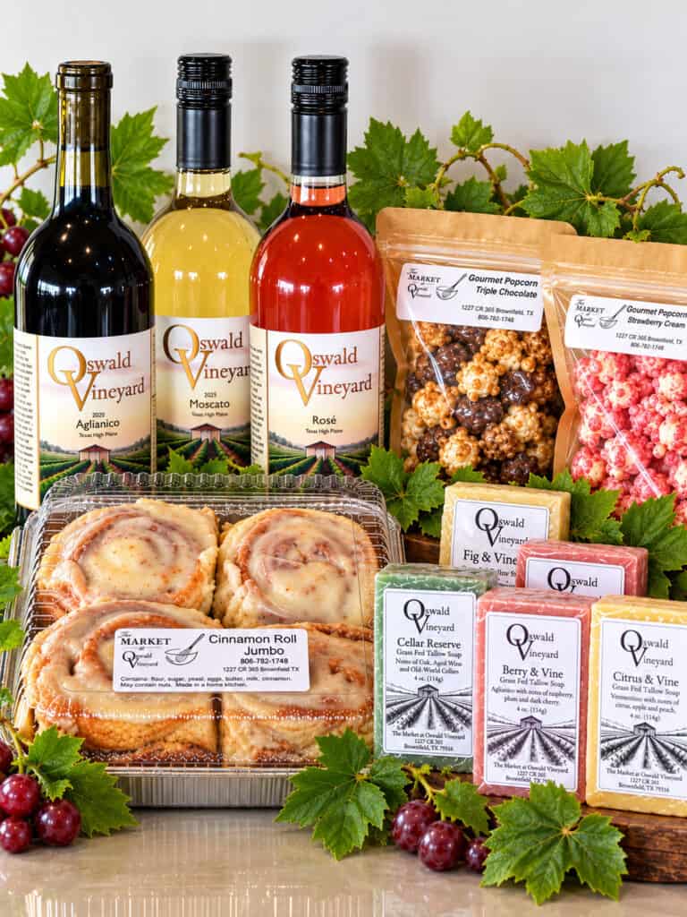 Corporate Gifts from Oswald Vineyard showing wine, cinnnamon rolls, wine-inspired soap and gourmet popcorn